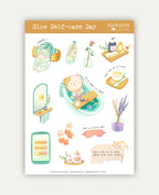 An image of a sticker sheet titled "Slow Self-care Day" featuring relaxing, wellness-themed illustrations on a white background with a light brown header. The central design shows a cat blissfully soaking in a turquoise bathtub with cucumber slices, next to the text *"It's okay to rest"*. Other stickers include a cat relaxing in a bathrobe with a towel wrapped around its head, a water bottle filled with fruit slices, a tea setup (*"One tea at a time"*), a mirror, cozy socks, a sleep mask (*"Just a little re